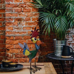 Funny garden rooster statue