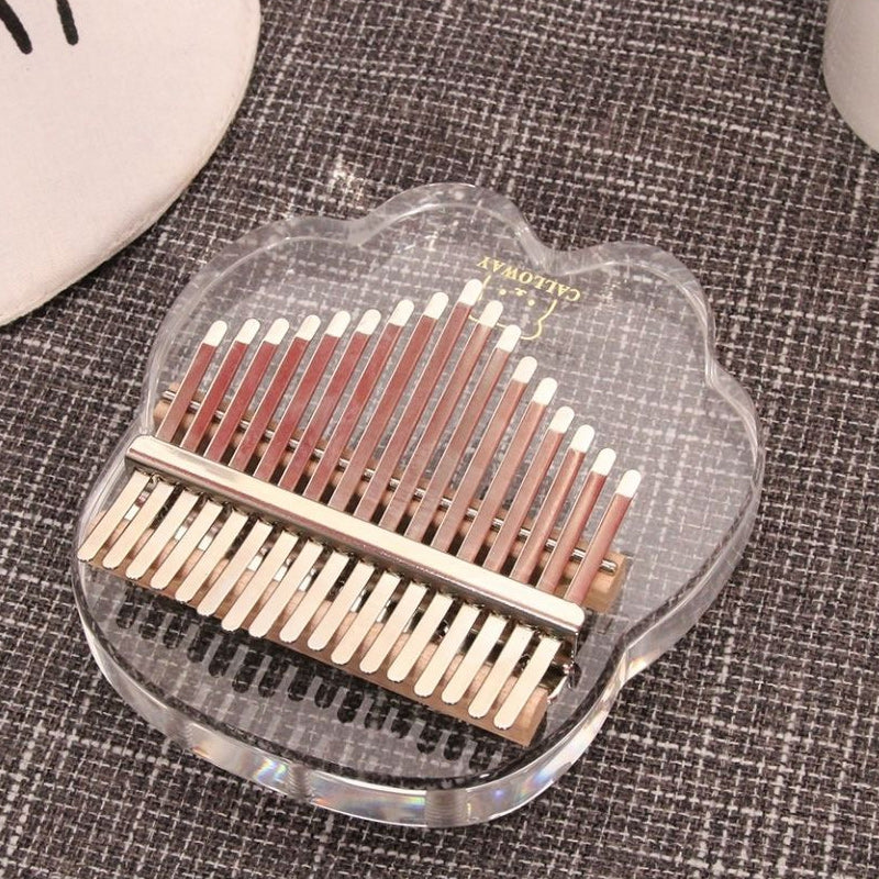 Portable thumb piano